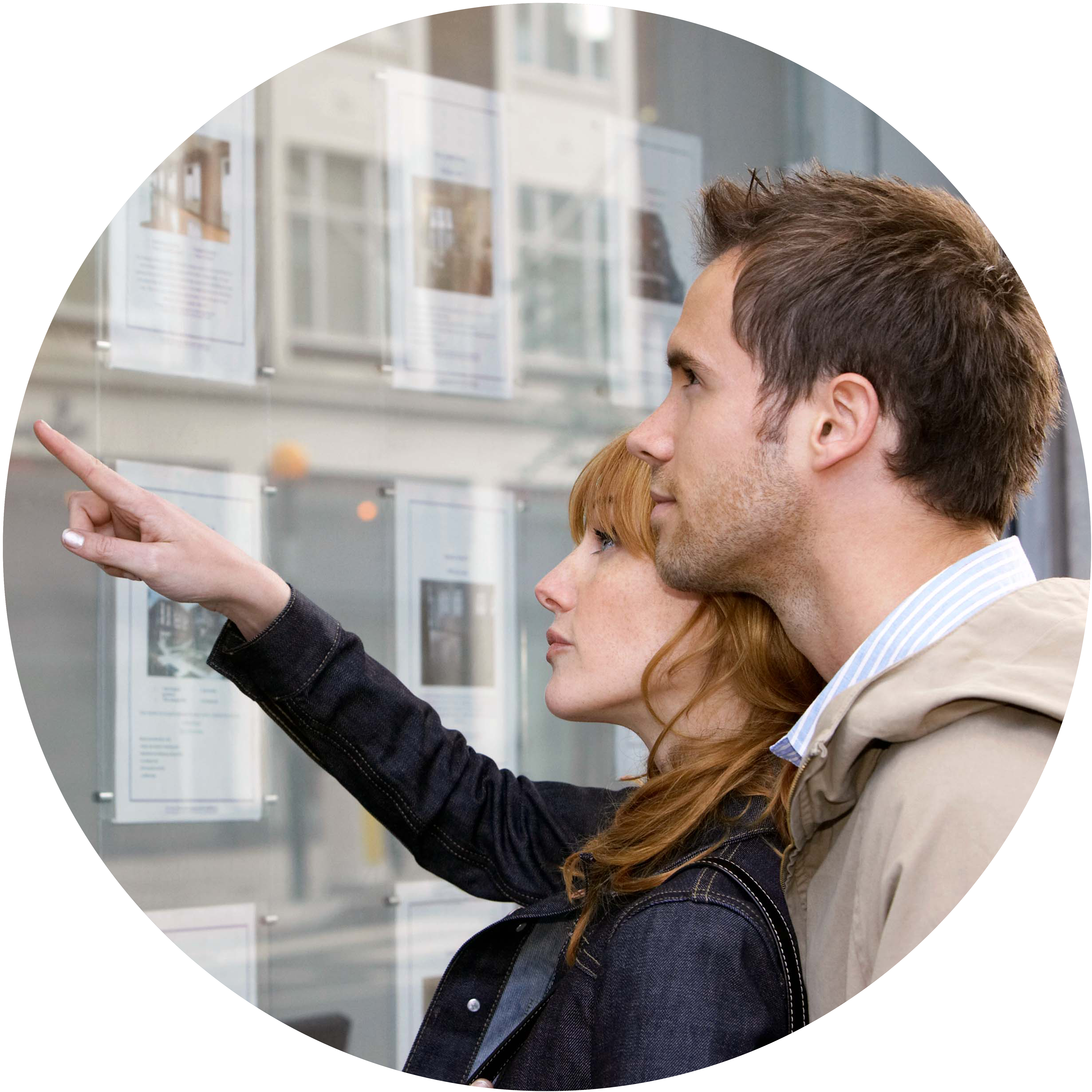 A couple looking at house advertisements